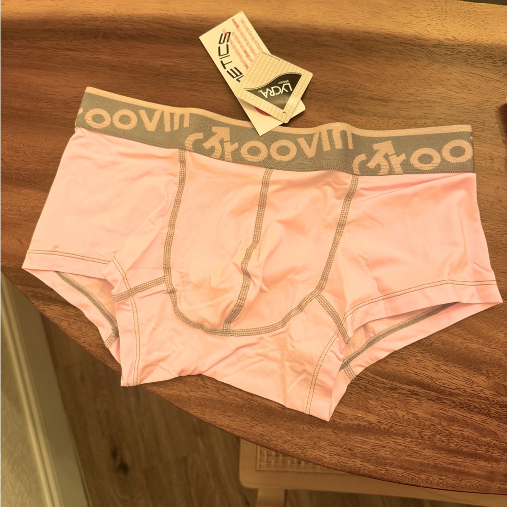 Pink boxer brief fits like a Large with nice pouch for your 🍆